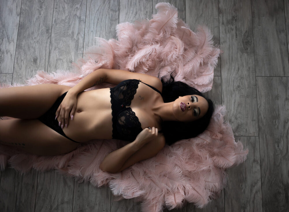 Boudoir image featuring angel wings